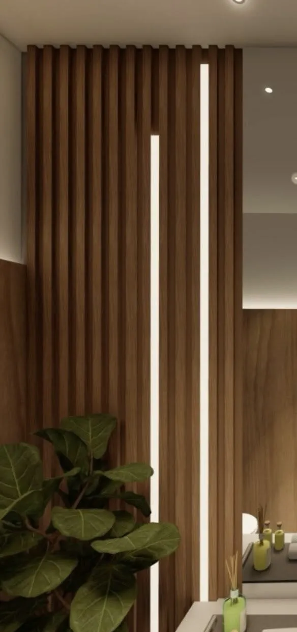 Lavabo com ripado de madeira e planta